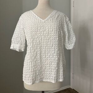 White gingham pattern blouse